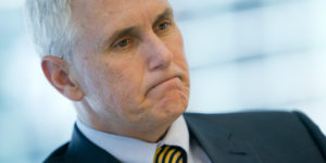 Michael "Mike" Pence, governor of Indiana, pauses during an interview in New York, U.S., on Thursday, May 16, 2013. The largest-ever U.S. municipal junk bond sale remains in limbo after Indiana learned that a Pakistani company backing a fertilizer plant financed by the biggest borrowing in state history is linked to explosives causing the most U.S. casualties in Afghanistan. Photographer: Andrew Harrer/Bloomberg via Getty Images